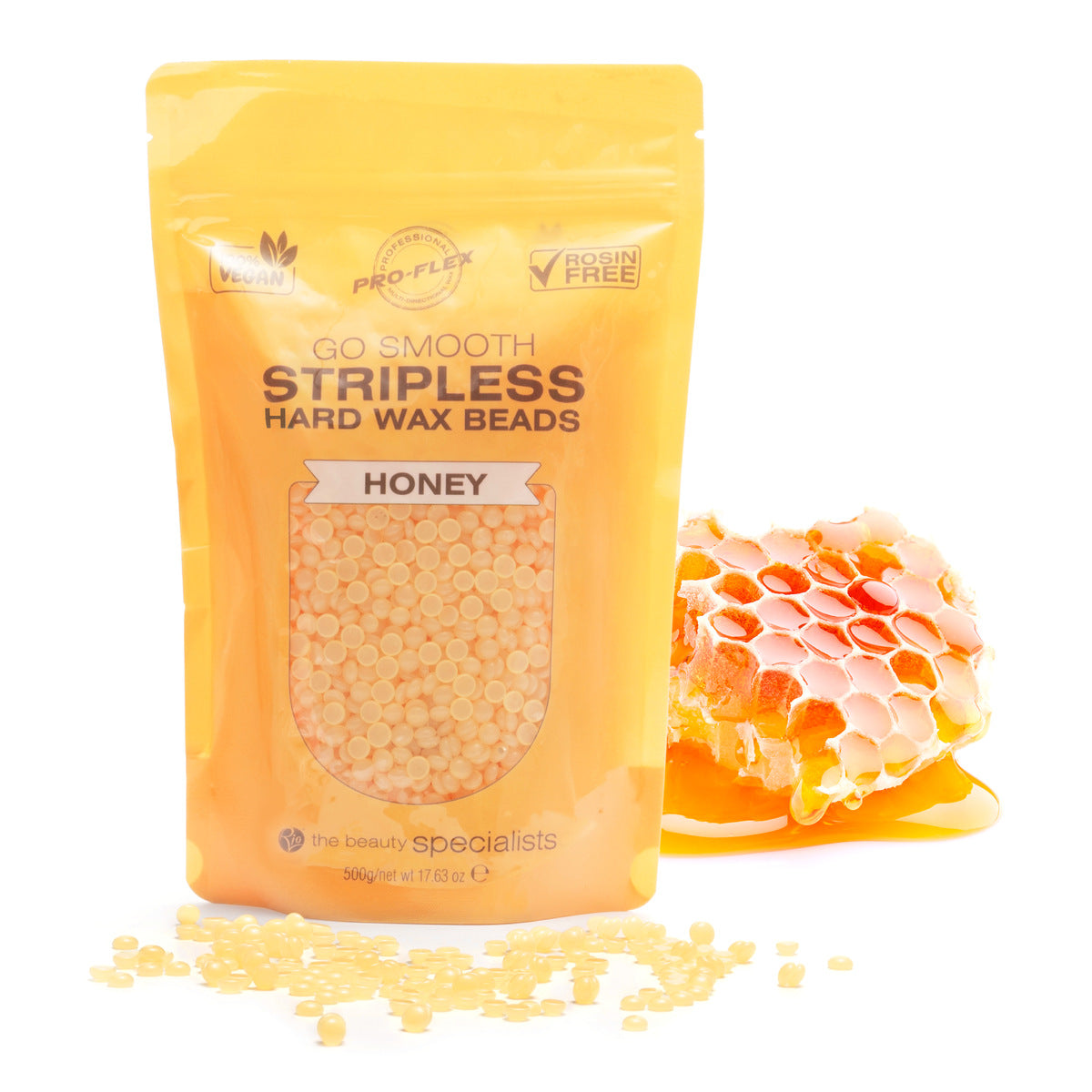 A yellow Rio pouch labeled Honey Go Smooth Stripless Hard Wax Beads (500g) stands upright with wax beads spilling out, while a honeycomb sits beside it on a white background, suggesting smooth skin results.