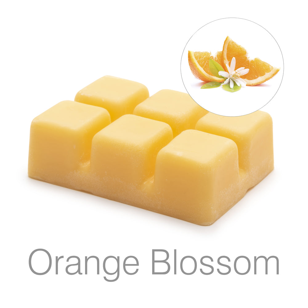The Rio Scented Soy Wax Melt - Orange Blossom Fragrance is a yellow six-segment block, featuring orange slices and a white flower inset to highlight its fresh scent, perfect for use in wax burners.