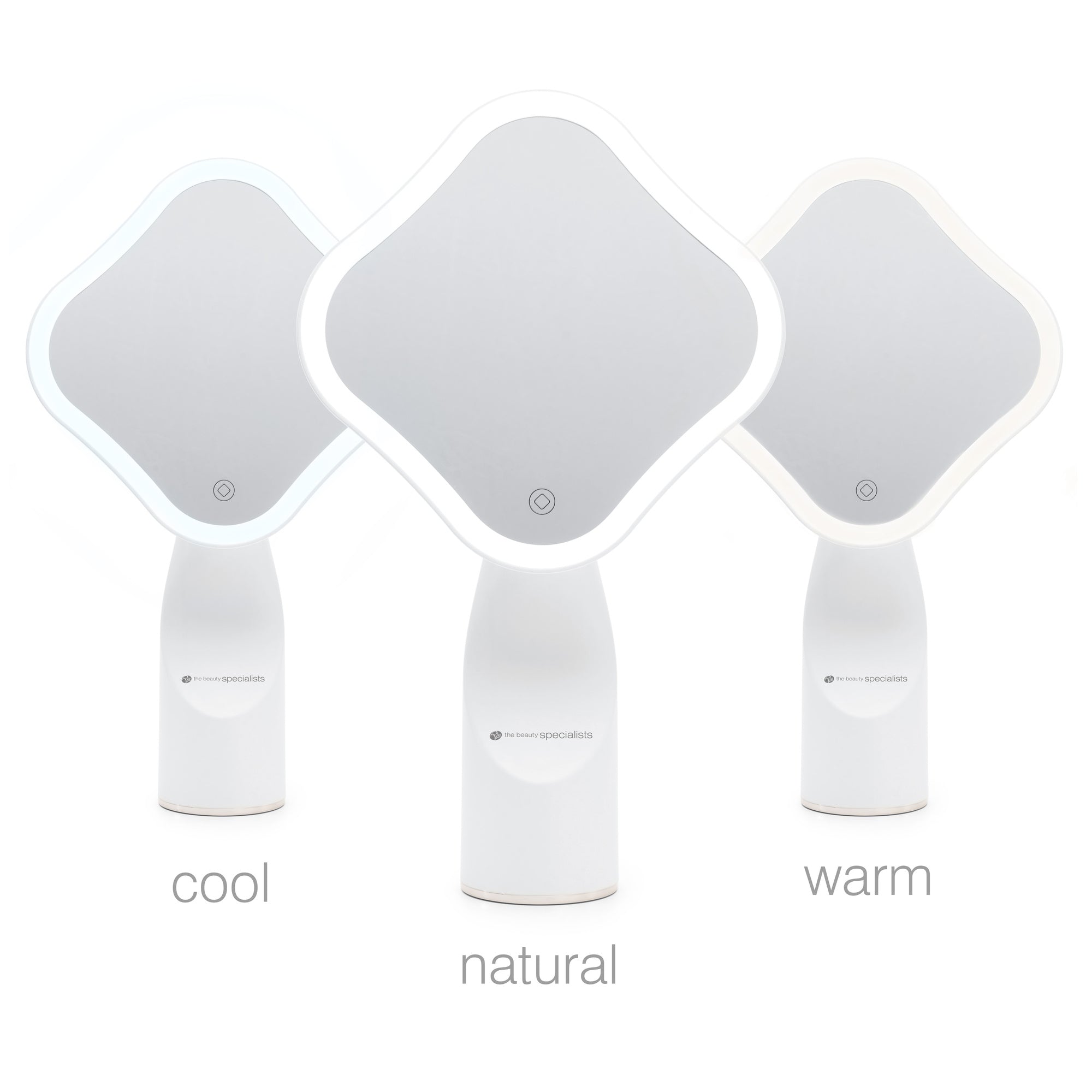 Three Rio Illuminated Full Size Beauty Mirrors are arranged side by side: the left shines with cool white light, the center displays natural light, and the right glows warm yellow. Each is labeled: “cool,” “natural,” and “warm.”.