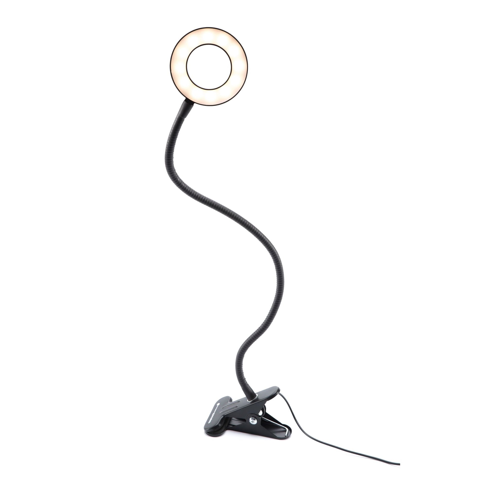 The Rio Beauty Station LED Ring Light features a flexible gooseneck stem in an “S” shape, a clip-on base, and an attached power cord. Its illuminated ring provides bright, adjustable lighting for any space.