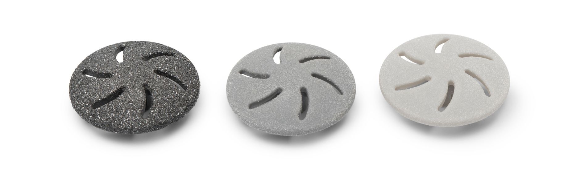 The Rio 60 Second Spa Pedi Replacement Heads - Pack of 3 includes black, gray, and white disks with six spiral slits, shown side by side on a white background—perfect for your 60 Second Pedi routine.
